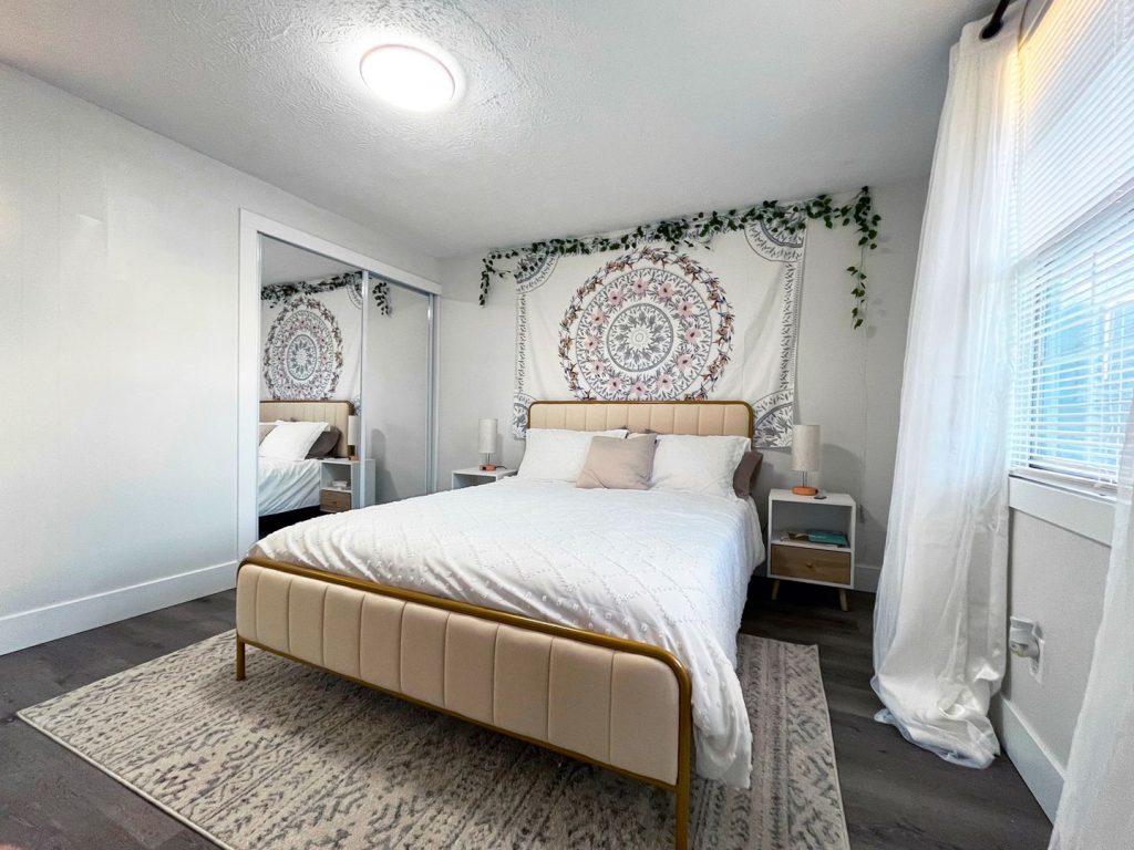 Woodgate Apartments, Johnstown, OH: bedroom with mirrored sliding closet doors