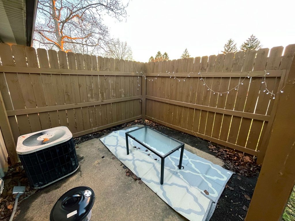 Woodgate Apartments, Johnstown, OH: private fenced patio behind an apartment