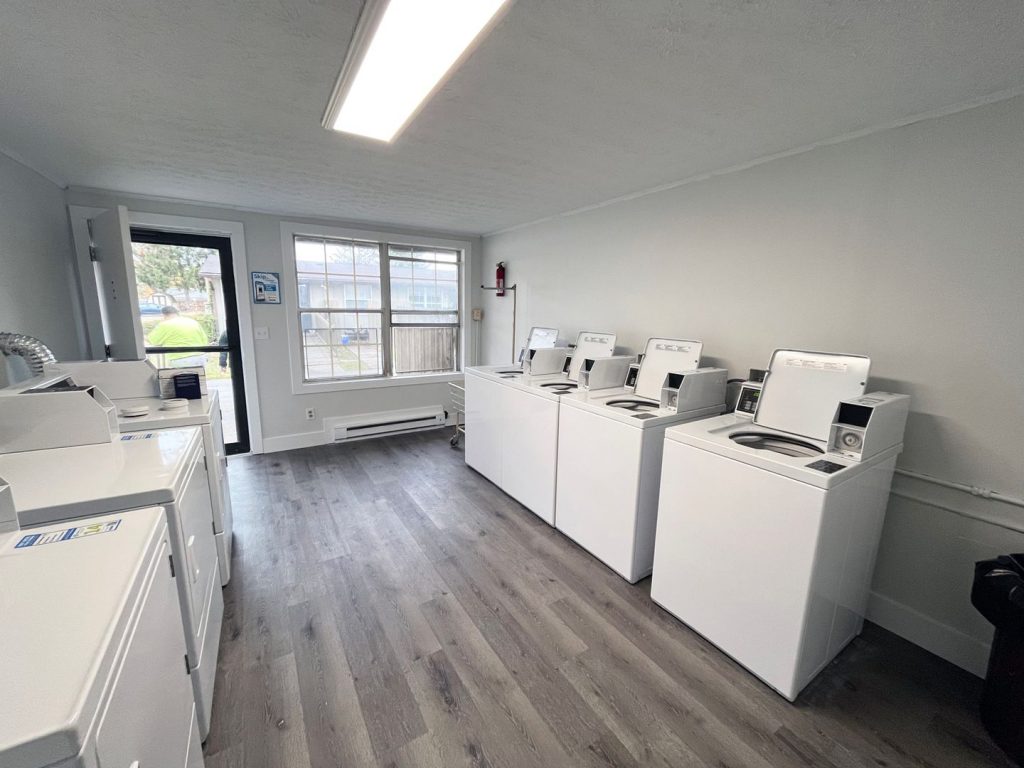 Woodgate Apartments, Johnstown, OH: on-site laundry room with washers and dryers