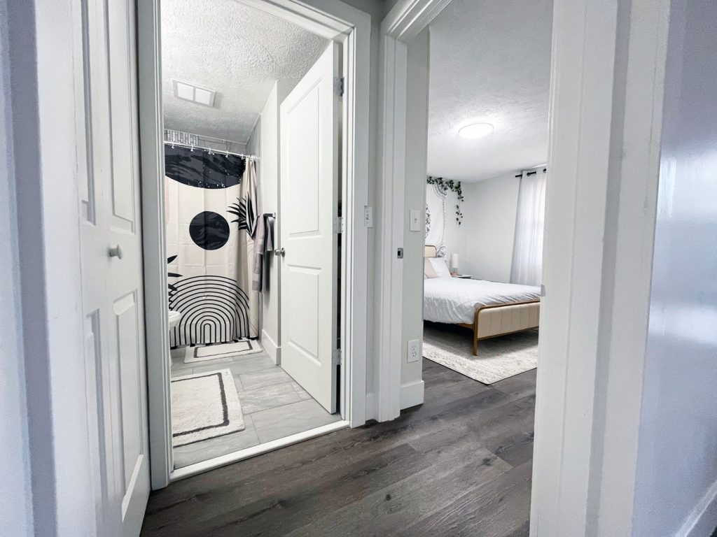 Woodgate Apartments, Johnstown, OH: hallway to the tiled bathroom and bedroom
